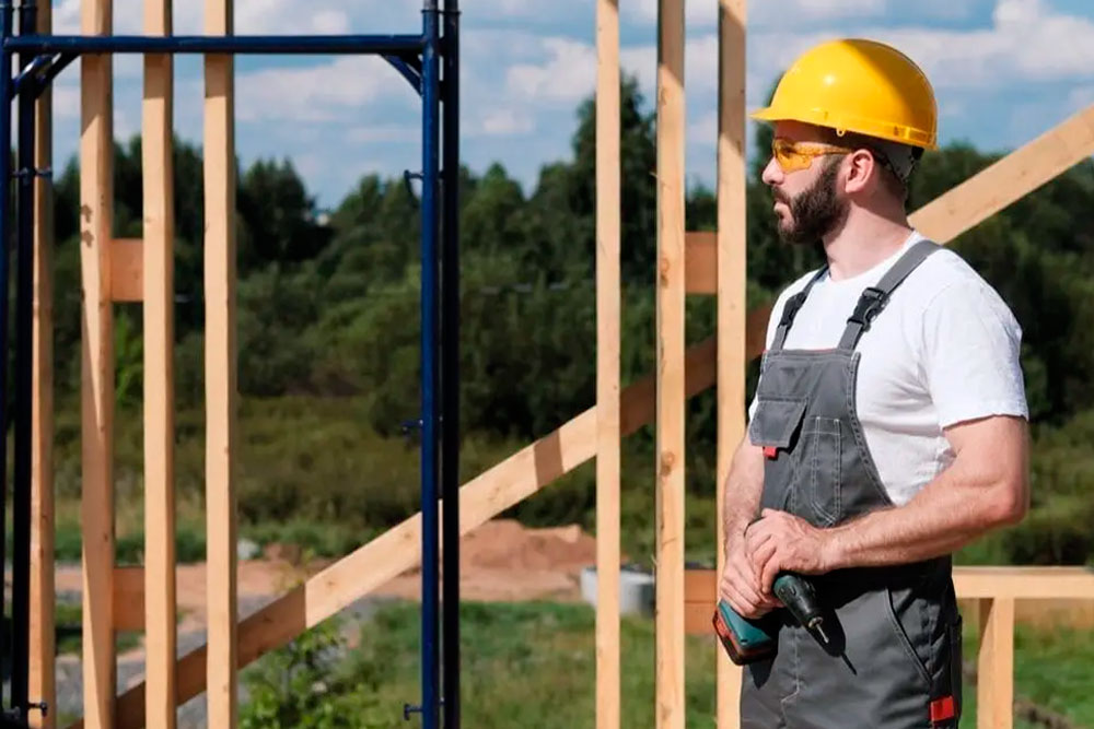 Construction worker checking his work and know what is Construction General Liability Insurance Protection?